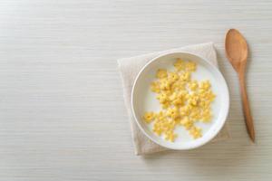 Whole grain cereals with fresh milk for breakfast photo