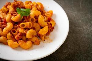 Macaroni with tomatoes sauce and mince pork, American chop suey, American goulash photo