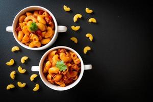 Macaroni with tomatoes sauce and mince pork, American chop suey, American goulash photo