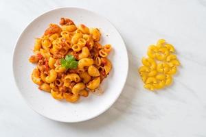 Macaroni with tomatoes sauce and mince pork, American chop suey, American goulash photo