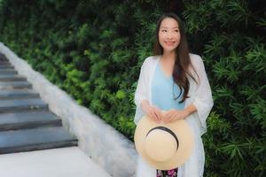 Portrait beautiful young asian women smile happy with outdoor photo