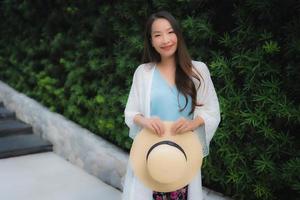 Portrait beautiful young asian women smile happy with outdoor photo