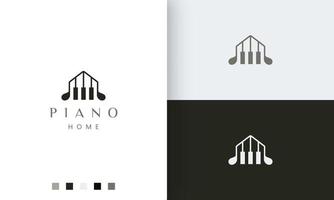 Logotipo o icono de la casa de piano simple y moderno. vector