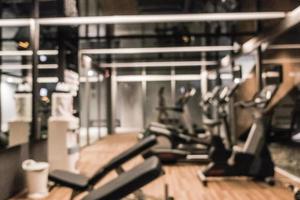 Abstract blur defocused fitness equipment and gym interior photo