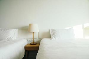 White pillow on the bed photo