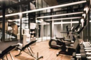 Abstract blur defocused fitness equipment and gym interior photo