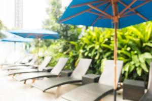 Abstract blur and defocused swimming pool in hotel and resort photo