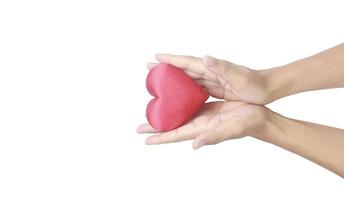 Hands holding red heart. heart health donation concepts photo
