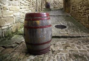 Wooden barrel on the street photo