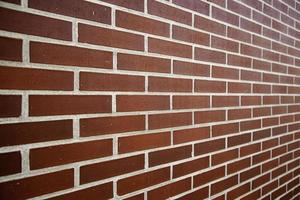 Brown brick wall photo