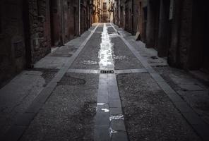 Old alley under the snow photo