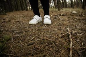 Nurse clogs in the woods photo