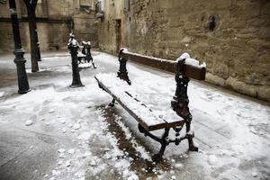 Snowy street benches photo