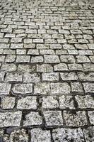 Wet cobblestone floor photo