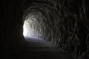Deep stone tunnel photo