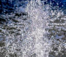 View of a fountain. Explosion of water. Waterjet view photo