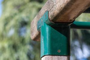 Calisthenics wooden bar. Healthy lifestyle on the park photo