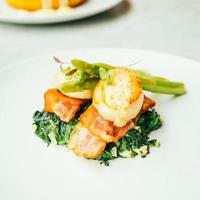 Scallops shell with bacon and asparagus photo