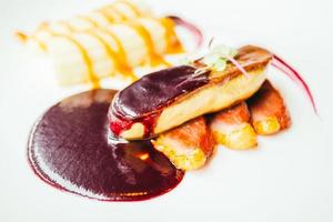 Foie gras and duck meat with sweet sauce photo