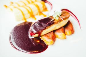Foie gras and duck meat with sweet sauce photo
