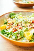 Grilled chicken with vegetable and pomegranate , fruits salad in plate - Color Filter Processing photo