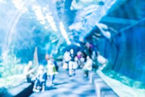 Abstract blur and defocused underwater of aquarium tunnel tank photo