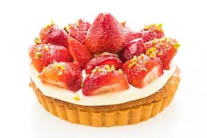 Sweet dessert with strawberry on top of tart photo