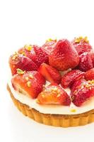 Sweet dessert with strawberry on top of tart photo