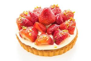 Sweet dessert with strawberry on top of tart photo