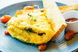 Spanich omelet in plate photo