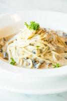 Spaghetti cream sauce with truffle mushroom photo