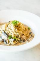 Spaghetti cream sauce with truffle mushroom photo
