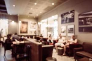 Abstract blur and defocused coffee shop cafe and restaurant interior photo