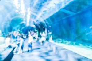 Abstract blur and defocused underwater of aquarium tunnel tank photo