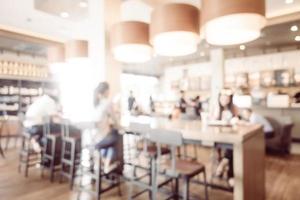 Interior de cafetería y restaurante borroso abstracto foto