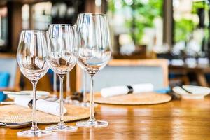 Wine glass on table photo