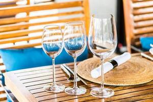 Wine glass on table photo