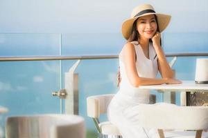 Portrait beautiful young asian woman smile happy in the sky bar and restaurant photo