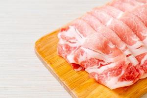 Fresh raw pork sirloin sliced photo