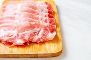 Fresh raw pork sirloin sliced photo