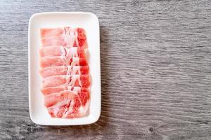 Fresh raw pork sirloin sliced photo