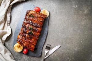 Grilled and barbecue ribs pork photo