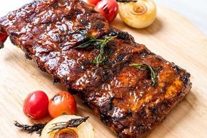 Grilled and barbecue ribs pork photo