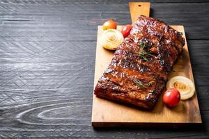 Grilled and barbecue ribs pork photo