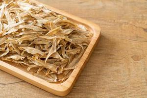 Dried small crispy baked fish photo