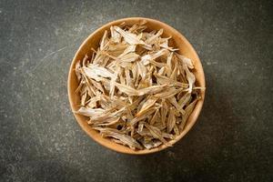 Dried small crispy baked fish photo