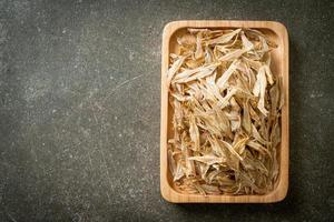 Dried small crispy baked fish photo