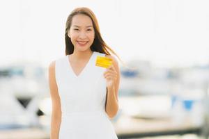 Portrait beautiful young asian woman leisure smile happy relax around yacht port photo