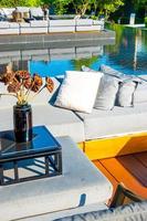 Pillows with outdoor patio deck and sofa on the balcony in a garden
