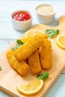 Fried fish finger sticks or french fries fish with sauce photo